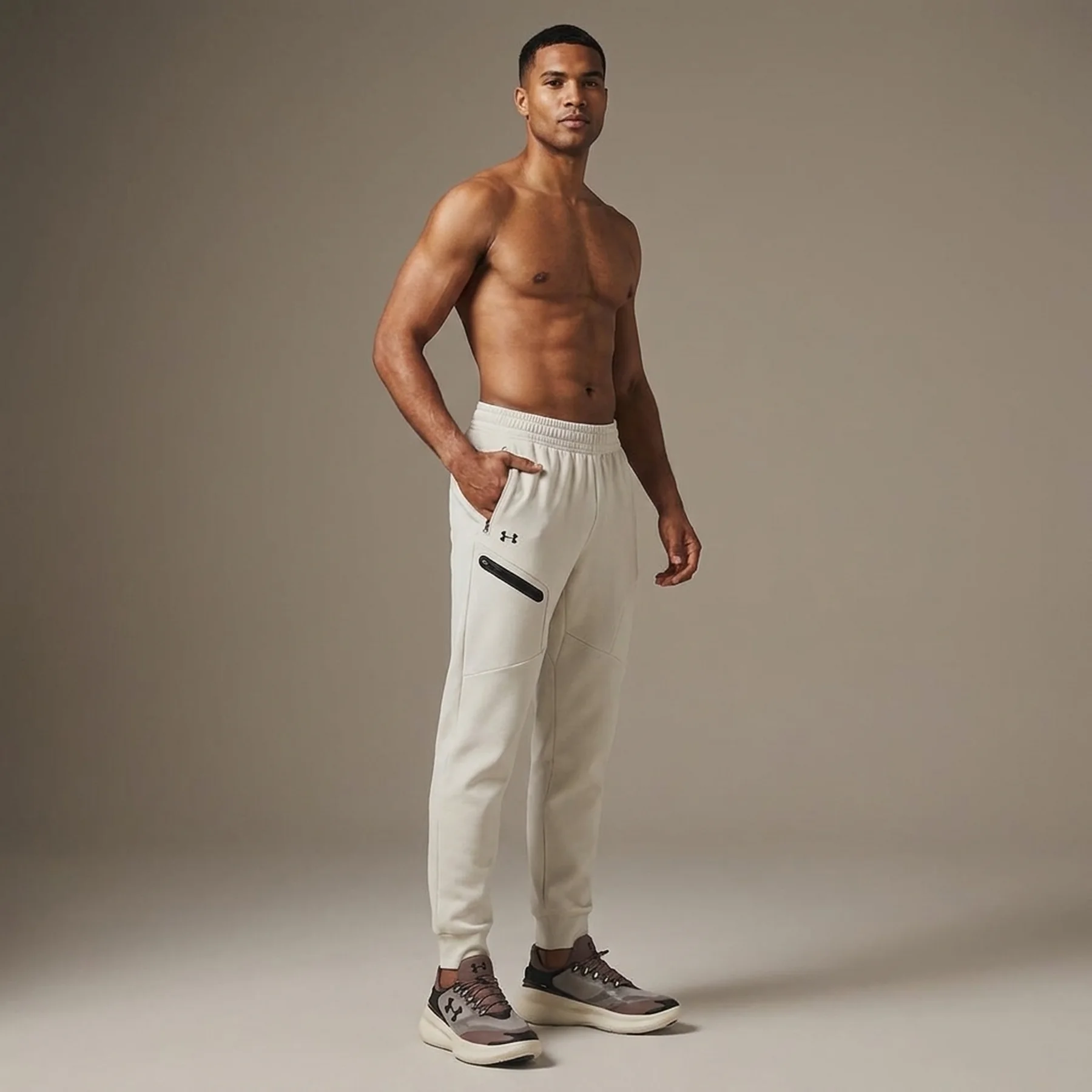 Спортивні штани Unstoppable Flc Jogger 1379846-110 Under Armour L Бежевий