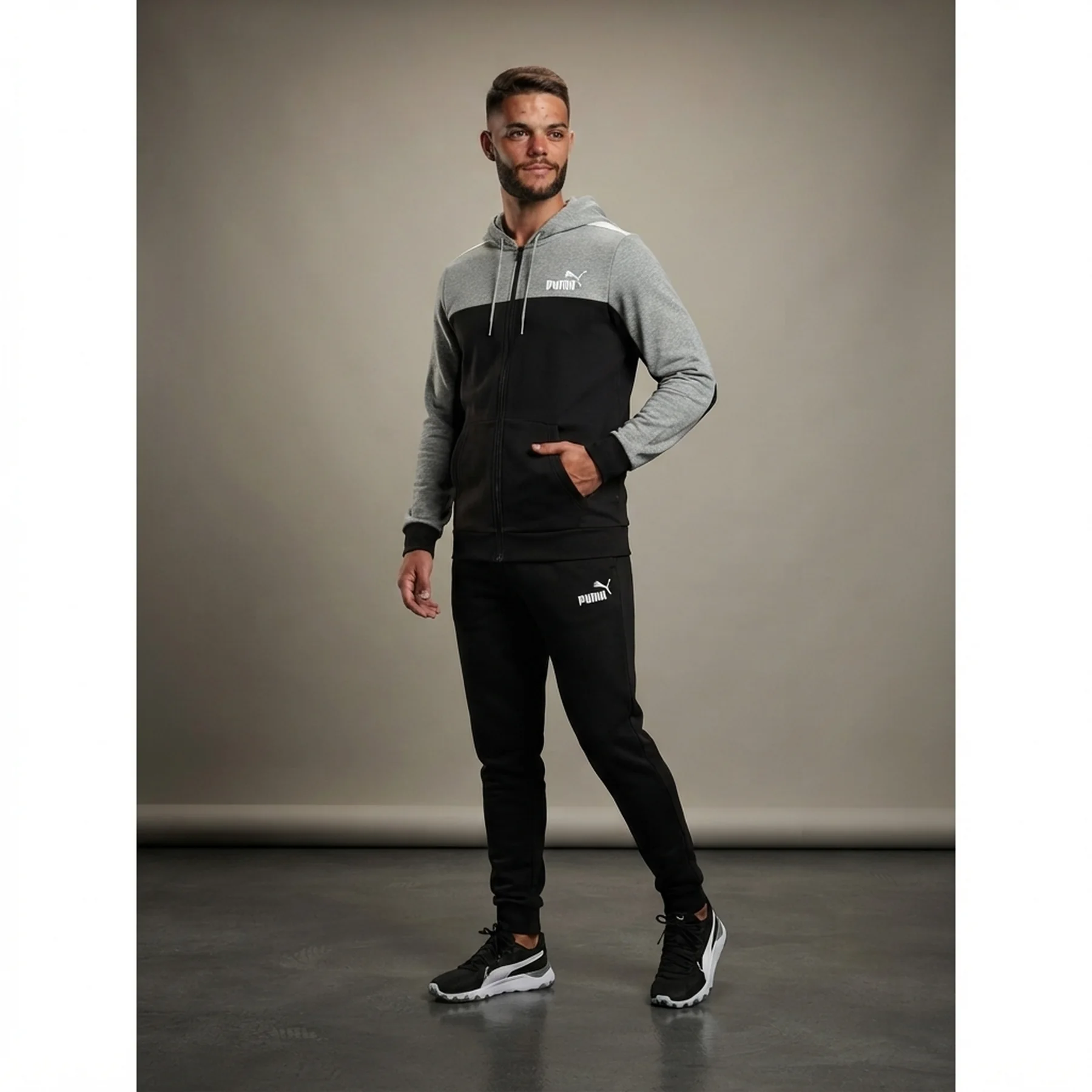 Спортивний костюм чоловічий Puma Tracksuit Essentials (670037-01)