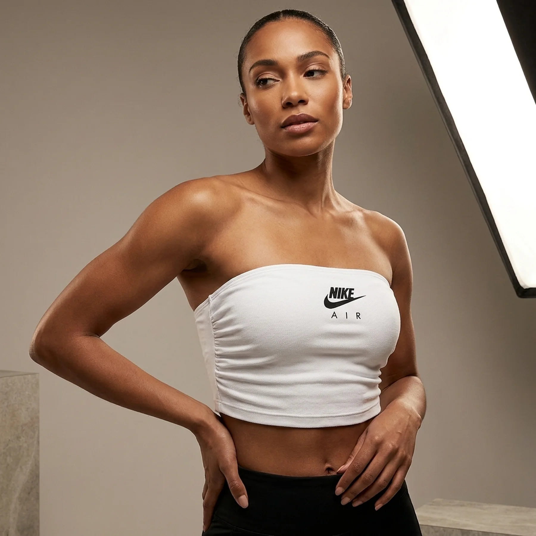 Спортивний топ жіночий Nike Air Pique Bandeau Top White (DM6460-100)