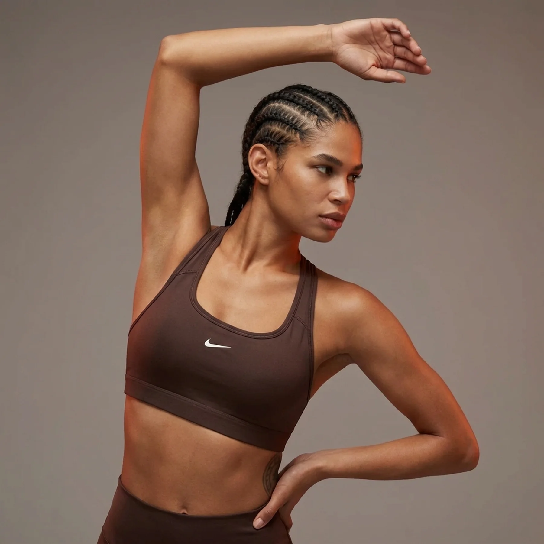 Спортивний топ жіночий Nike Swoosh Light Support (DX6817-237)