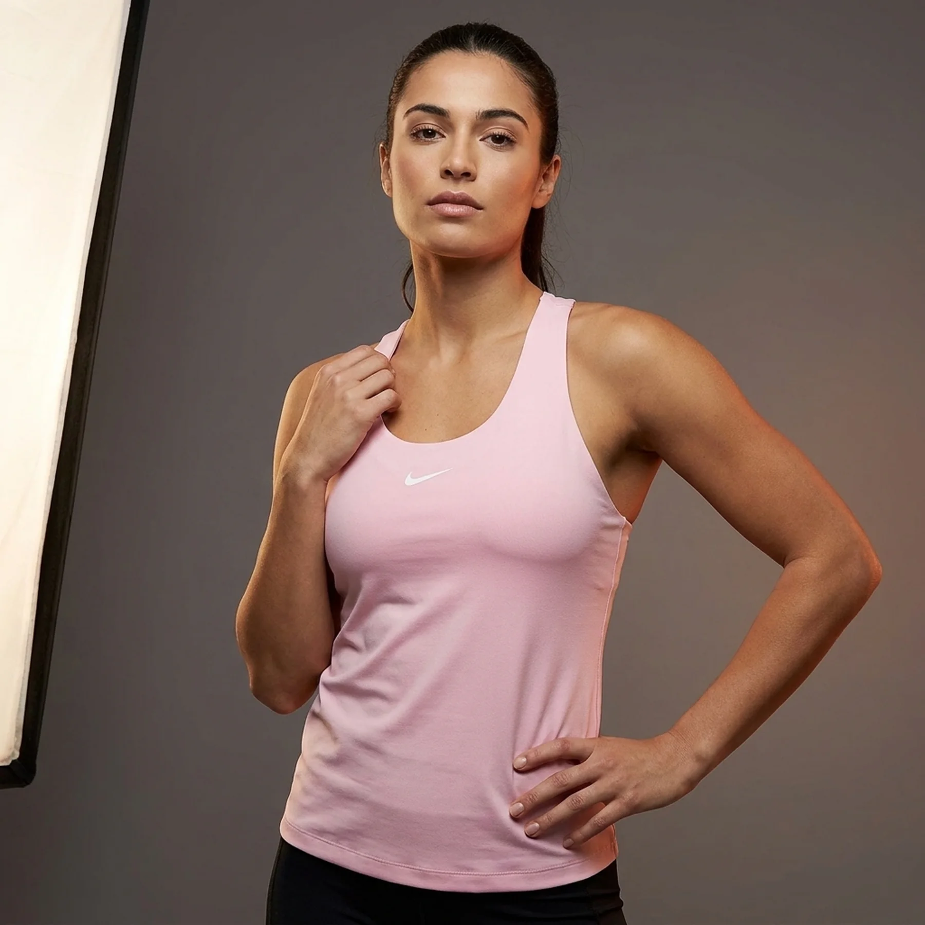 Спортивний топ жіночий Nike W Nk Df Swoosh Bra Tank (DV9897-690)