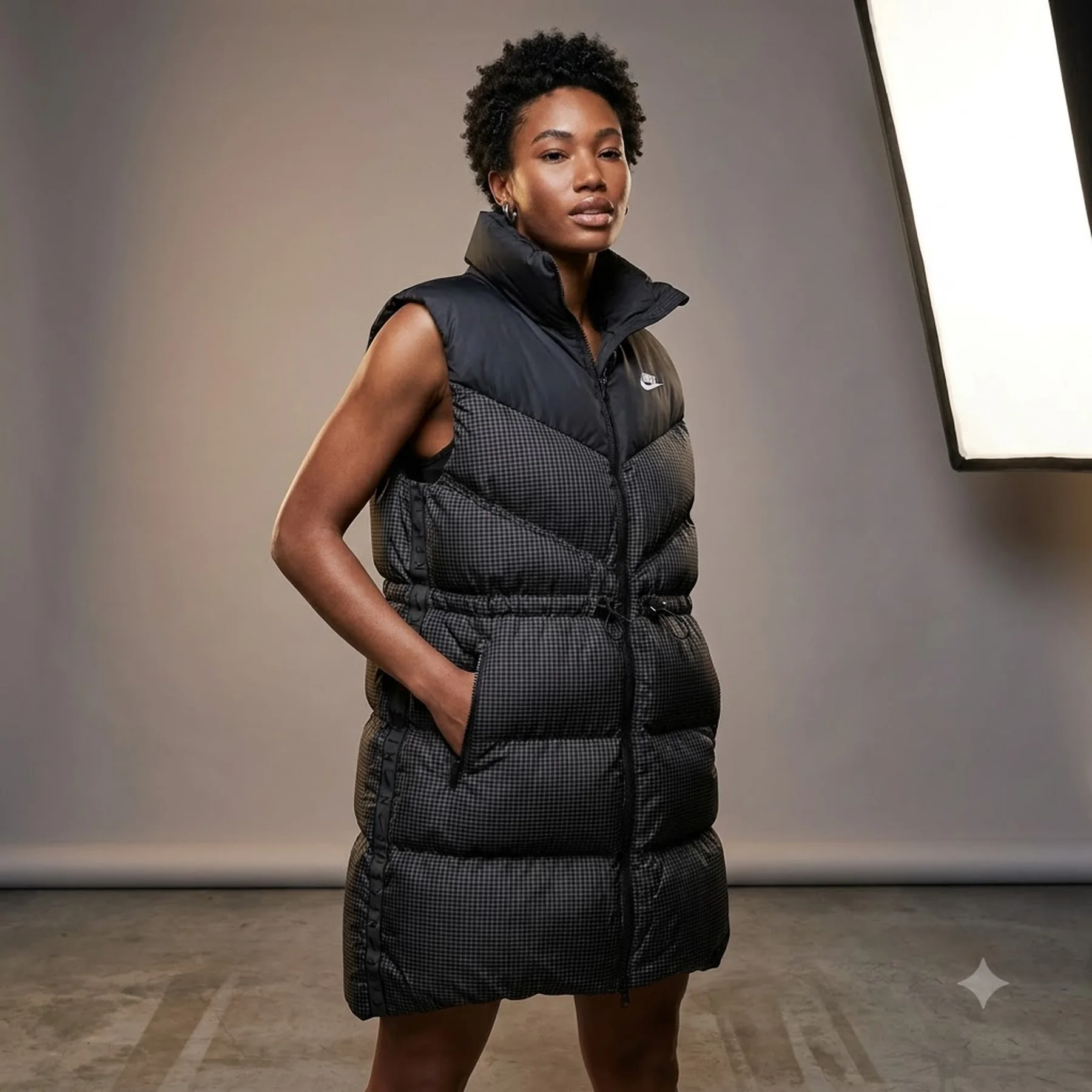 Жилетка жіноча Nike Therma-Fit Loose Long Puffer Vest (FB8794-010)