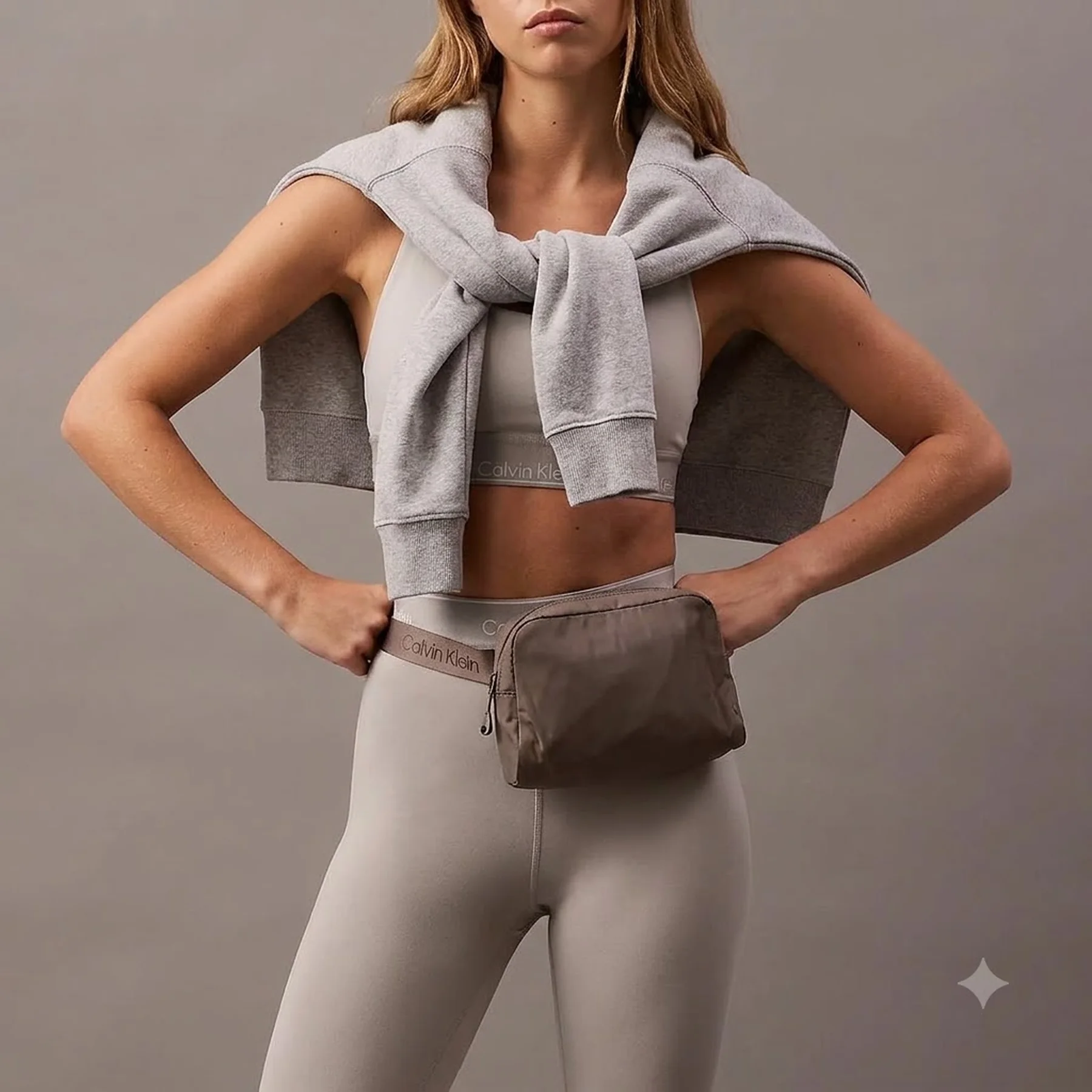 Жіноча поясна сумка Calvin Klein 1159829408 (Сірий One size)